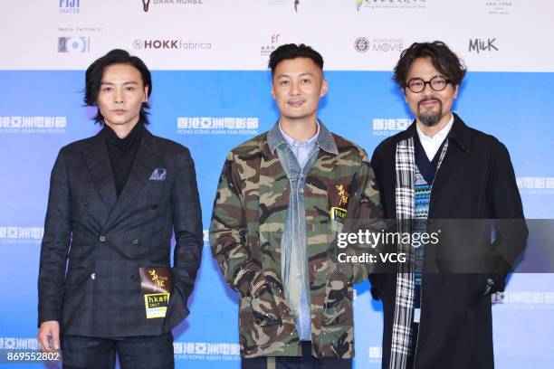 Actor Max Zhang Jin, actor Shawn Yue and actor Gordon Lam Ka Tung attend the premiere of film "The Brink" on November 2, 2017 in Hong Kong, China.