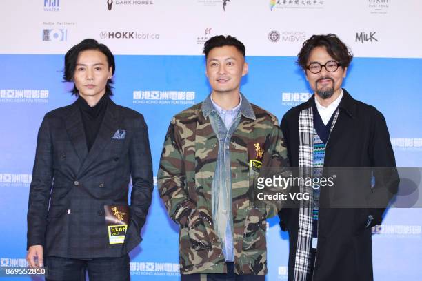 Actor Max Zhang Jin, actor Shawn Yue and actor Gordon Lam Ka Tung attend the premiere of film "The Brink" on November 2, 2017 in Hong Kong, China.