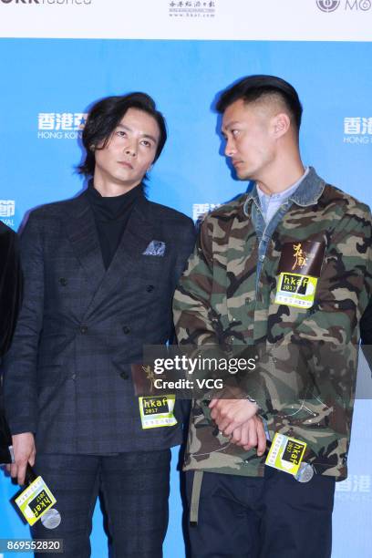 Actor Shawn Yue and actor Max Zhang Jin attend the premiere of film "The Brink" on November 2, 2017 in Hong Kong, China.