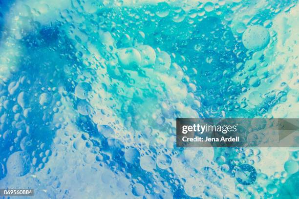 bubbles abstract background blue - dissolving stock pictures, royalty-free photos & images