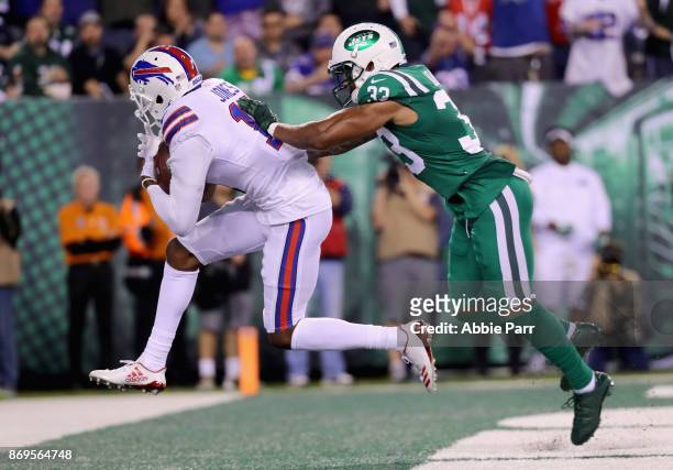 Wide receiver Zay Jones of the Buffalo Bills scores a touchdown against strong safety Jamal Adams of the New York Jets during the second quarter of...