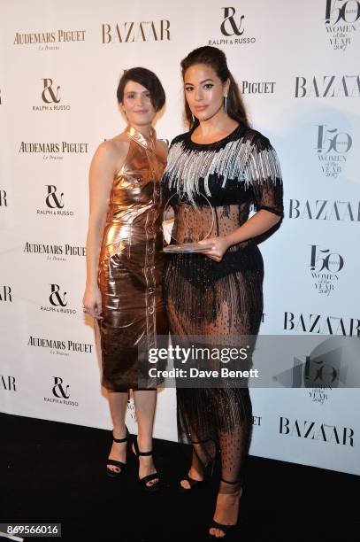 Gemma Arterton and Ashley Graham, winner of the Model of the Year award, attend Harper's Bazaar Women of the Year Awards in association with Ralph &...