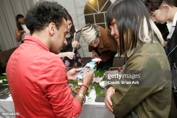 Sourabh Sharma and Mimi So attend FLONT Stylist Membership Launch in New York at the Elizabeth Arden Red Door Spa on November 2, 2017 in New York...