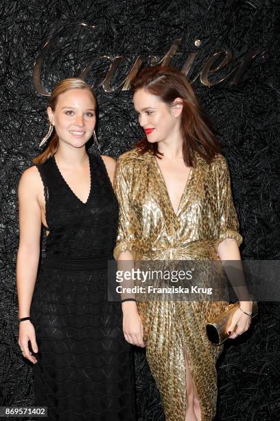 Sonja Gerhardt and Emilia Schuele wearing a Juste un Clou Bracelet and Juste un Clou Ring and the Michael Kors Collection attend the When the...