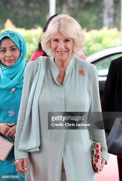 Her Majesty Raja Zarith Sofiah, The Queen of Johor and Camilla, Duchess of Cornwall arrive at The International School at ParkCity on November 3,...