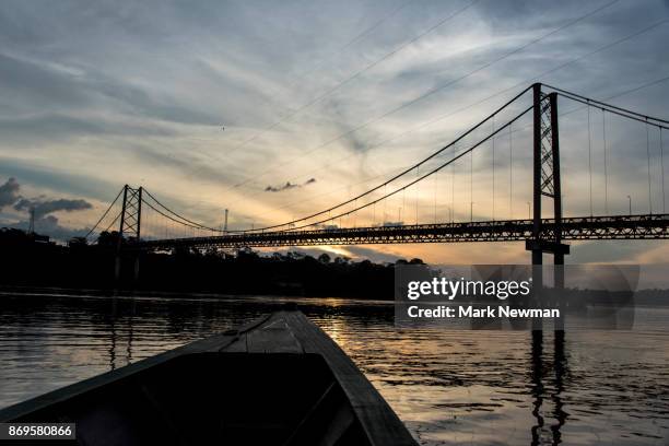 bridge across madre de dios river - puerto maldonado fotografías e imágenes de stock