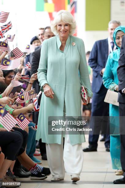 Camilla, Duchess of Cornwall and Her Majesty Raja Zarith Sofiah, The Queen of Johor meet students at The International School at ParkCity on November...