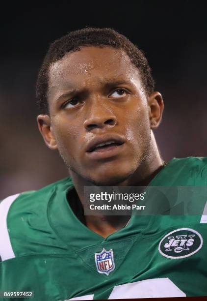 Inside linebacker Darron Lee of the New York Jets looks on against the Buffalo Bills during the second half of the game at MetLife Stadium on...
