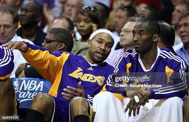 Guard Derek Fisher and Kobe Bryant of the Los Angeles Lakers during play against the Houston Rockets in Game Four of the Western Conference...