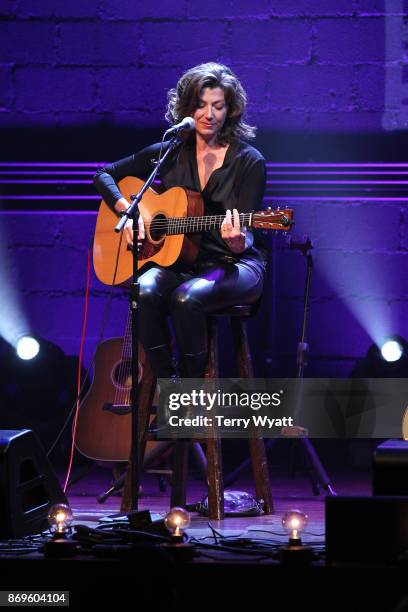 Singer-songwriter Amy Grant performs during 'Best Buddies Unplugged' at Franklin Theatre on November 2, 2017 in Franklin, Tennessee.