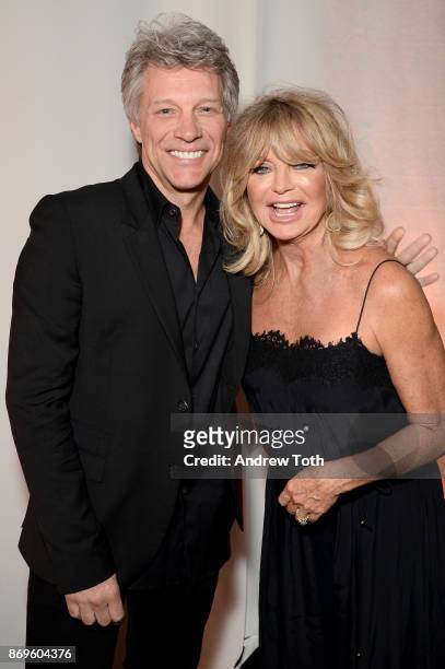 Jon Bon Jovi and Goldie Hawn pose backstage at the Samsung annual charity gala 2017 at Skylight Clarkson Sq on November 2, 2017 in New York City.