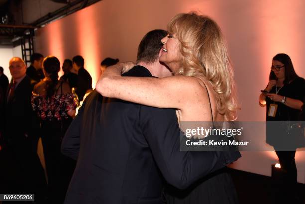 Rob Thomas hugs Goldie Hawn at the Samsung annual charity gala 2017 at Skylight Clarkson Sq on November 2, 2017 in New York City.