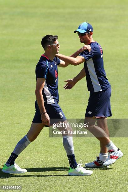 James Anderson and Alistair Cook of England warm up during an England Ashes series nets session at the WACA on November 3, 2017 in Perth, Australia.