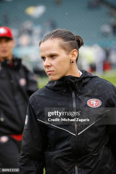 Offensive Assistant Coach Katie Sowers of the San Francisco 49ers stands on the field prior to the game against the Philadelphia Eagles at Lincoln...