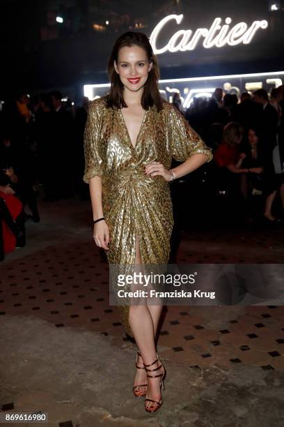 Emilia Schuele wearing a Juste un Clou Bracelet and Juste un Clou Ring and the Michael Kors Collection attends the When the Ordinary becomes Precious...