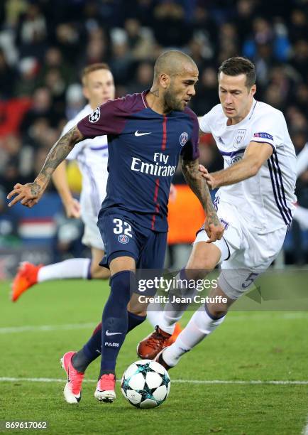 Dani Alves aka Daniel Alves of PSG, Uros Spajic of Anderlecht during the UEFA Champions League group B match between Paris Saint-Germain and RSC...