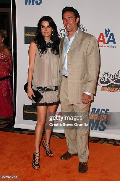 Actress Angie Harmon and actor Jason Sehorn arrive at the 16th Annual Race to Erase MS event co-chaired by Nancy Davis and Tommy Hilfiger at Hyatt...