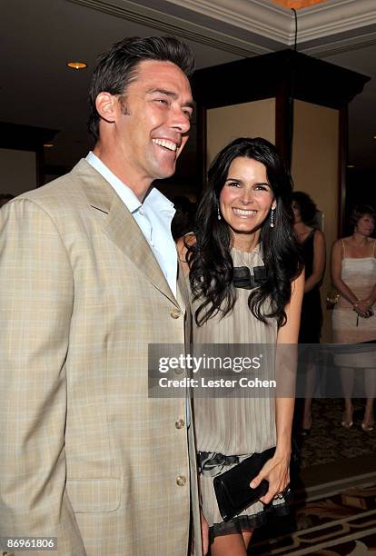 Player Jason Sehorn and Actress Angie Harmon attend the 16th Annual Race To Erase MS cocktail reception co-chaired by Nancy Davis and Tommy Hilfiger...