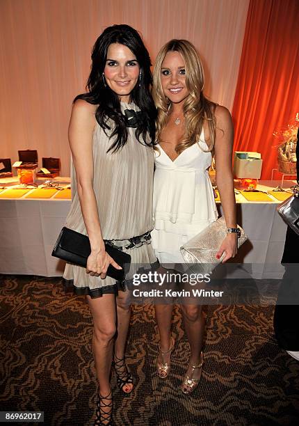 Actresses Angie Harmon and Amanda Bynes attend the 16th Annual Race To Erase MS cocktail reception co-chaired by Nancy Davis and Tommy Hilfiger at...