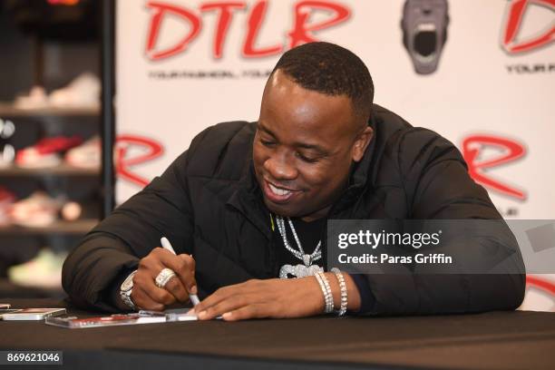 Main Gotti Rapper Yo Gotti Album Lp Signing Photos and Premium High Res Pictures - Getty ...