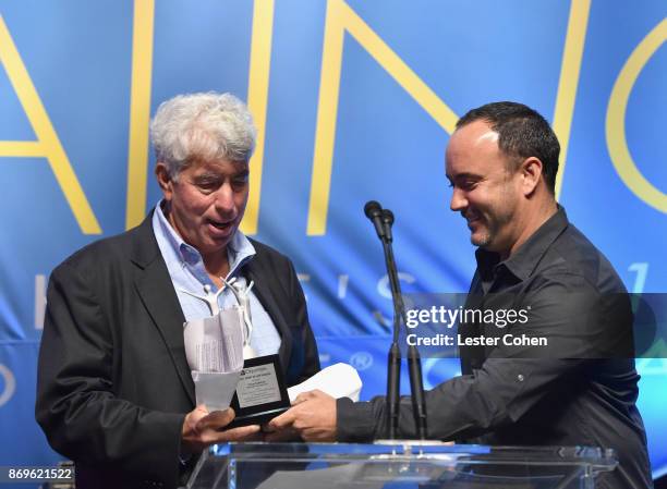 Honoree Coran Capshaw accepts the Spirit of Life Award from Dave Matthews at MFEI Spirit Of Life Honoring Coran Capshaw on November 2, 2017 in Santa...