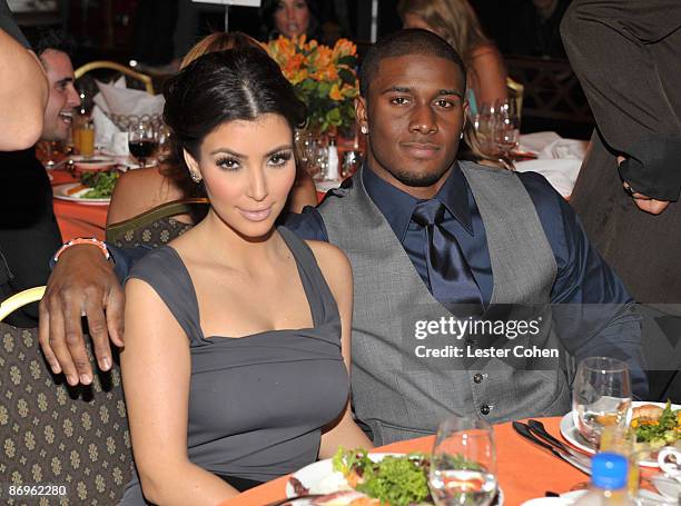 Socialite Kim Kardashian and NFL Player Reggie Bush attend the 16th Annual Race to Erase MS event co-chaired by Nancy Davis and Tommy Hilfiger at...