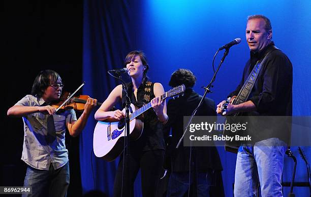 Lily Costner and Kevin Costner perform together with Kevin Costner & Modern West at the World Cafe Live on May 10, 2009 in Philadelphia, Pennsylvania.