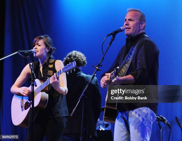 Lily Costner and Kevin Costner perform together with Kevin Costner & Modern West at the World Cafe Live on May 10, 2009 in Philadelphia, Pennsylvania.