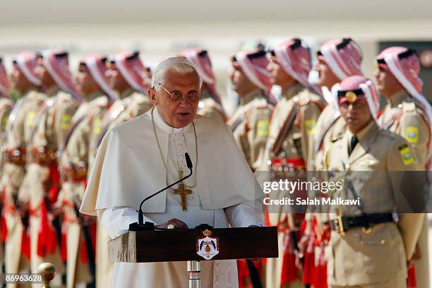Pope Benedict XVI gives a speech at Queen Alia airport as he prepares to depart after a 4-day visit to Jordan, on a special 'Royal Jordanian...