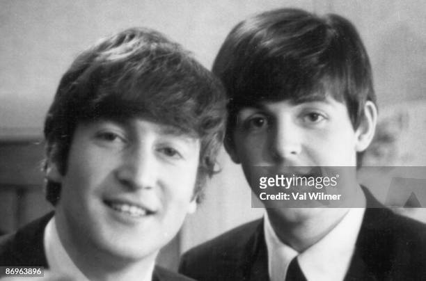30th DECEMBER: Paul McCartney and John Lennon from The Beatles posed backstage at the Finsbury Park Astoria, London during the band's Christmas Show...