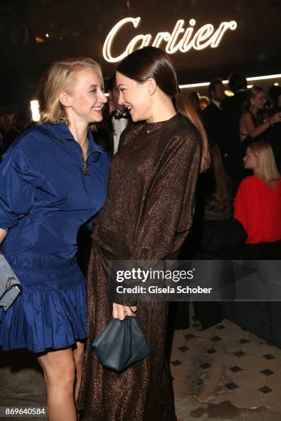 Anna Maria Muehe and Hannah Herzsprung during the 'When the Ordinary becomes Precious #CartierParty Berlin ' at Old Power Station on November 2, 2017...