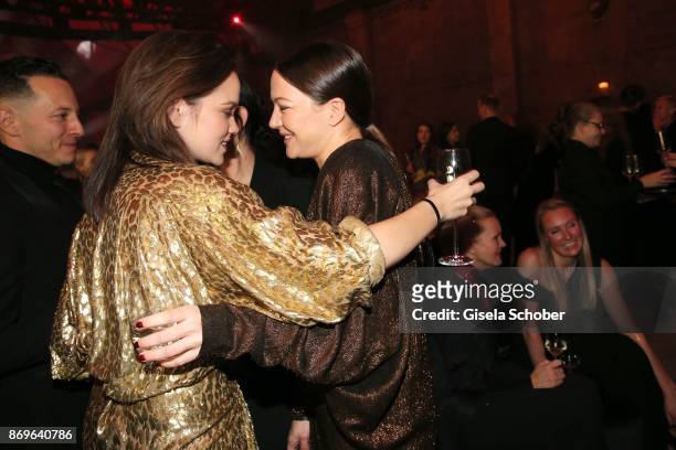 Emilia Schuele and Hannah Herzsprung during the 'When the Ordinary becomes Precious #CartierParty Berlin' at Old Power Station on November 2, 2017 in...