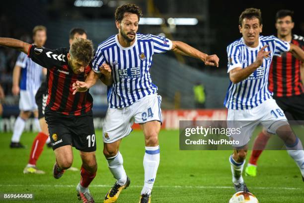 Hovhannes Hambartsumyan of FK Vardar duels for the ball with De la Bella of Real Sociedad during the UEFA Europa League Group L football match...