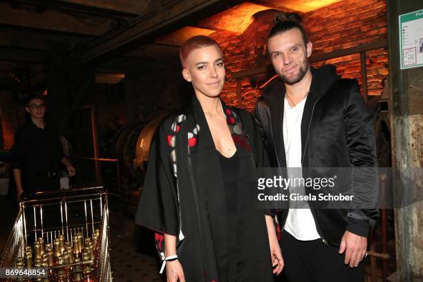 Alina Sueggeler, singer of the band 'Frida Gold' and Andi Weizel during the 'When the Ordinary becomes Precious #CartierParty Berlin' at Old Power...