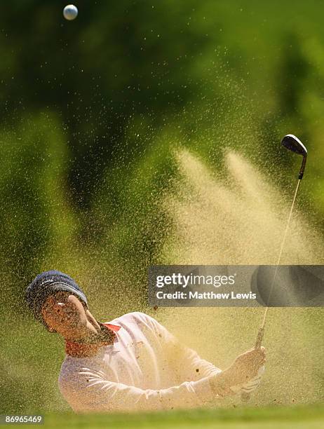 Daniel Seymour of Newbury Golf Centre plays out of the bunker on the 16th hole during the PGA Powerade Assistants' Championship Midland Regional...