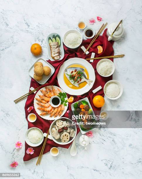 chinese new year food and drink, reunion dinner still life. - lunar new year cup 2017 stock-fotos und bilder