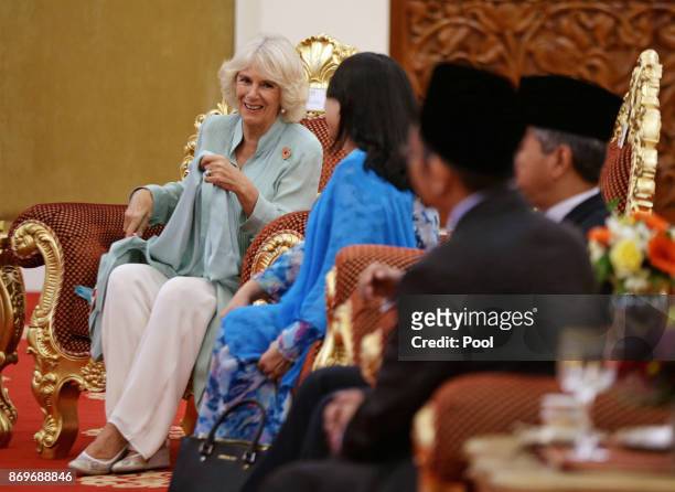 Camilla, The Duchess of Cornwall awaits the arrival of His Majesty The Yang di-Pertuan Agong XV Sultan Muhammad V at his official residence, Istana...