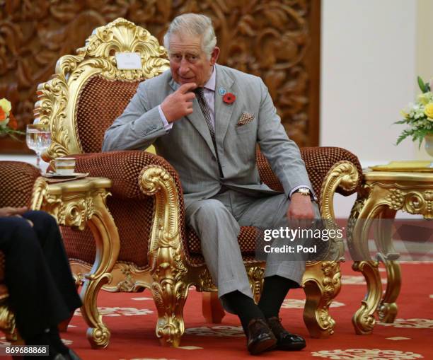 Prince Charles,The Prince of Wales awaits the arrival of His Majesty The Yang di-Pertuan Agong XV Sultan Muhammad V at his official residence, Istana...