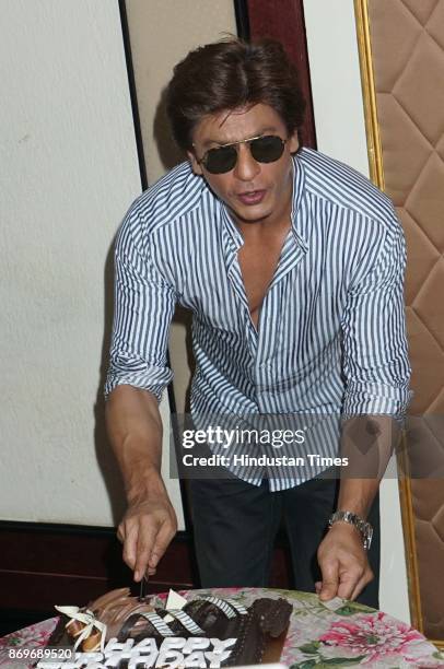 Bollywood actor Shah Rukh Khan celebrates his 52nd birthday, at Mannat, Bandstand, on November 2, 2017 in Mumbai, India. Shah Rukh met the media, cut...