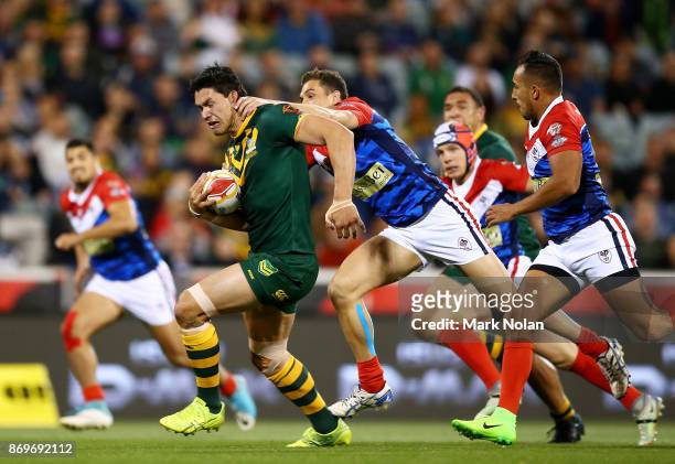Jordan McLean of Australia makes a line break during the 2017 Rugby League World Cup match between Australian Kangaroos and France at Canberra...