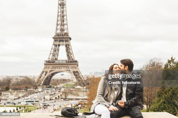 the city of romance - betrothed couple stock pictures, royalty-free photos & images