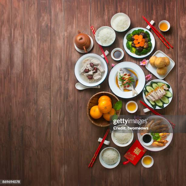 chinese new year food and drink, reunion dinner still life. - lunar new year cup 2017 stock-fotos und bilder