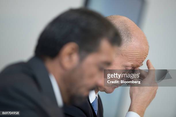 Tom Enders, chief executive officer of Airbus SE, right, pauses during a news conference with Sheikh Ahmed bin Saeed Al Maktoum, chief executive...