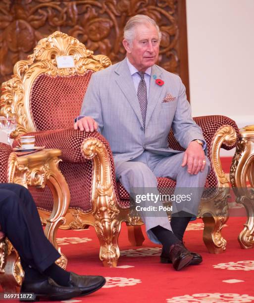 Prince Charles,The Prince of Wales talks with His Majesty The Yang di-Pertuan Agong XV Sultan Muhammad V at his official residence, Istana Negara on...