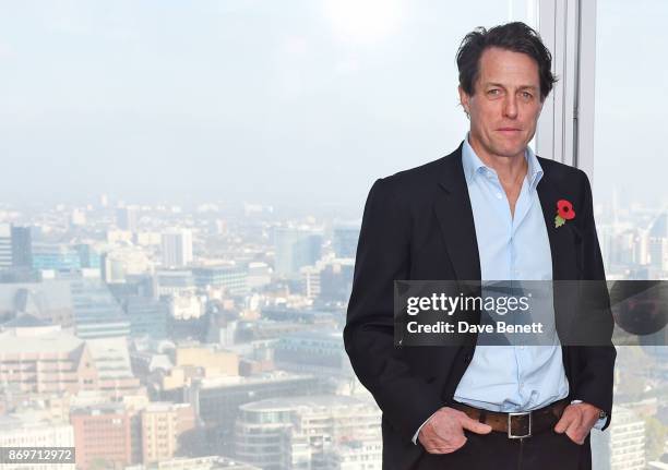 Hugh Grant attends a photocall for "Paddington 2" at Shangri-La Hotel, The Shard, on November 3, 2017 in London, England.