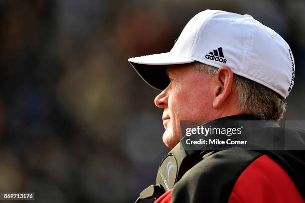 Head coach Bobby Petrino of the Louisville Cardinals looks on following a Wake Forest Demon Deacons score late in the fourth quarter of the football...