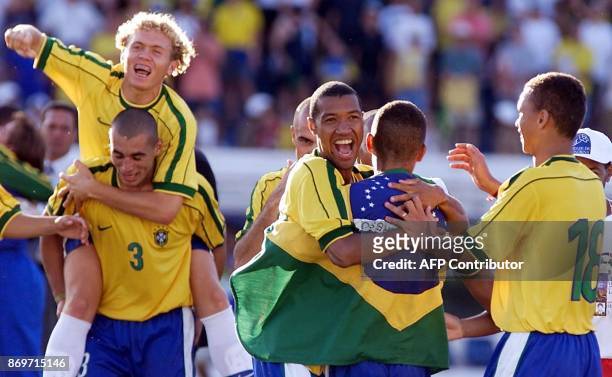 Mozart , Fabio Bilica , Lucas , Alex and Warley , players from the Brazilian soccer team celebrate their championship in the pre-Olympic soccer...