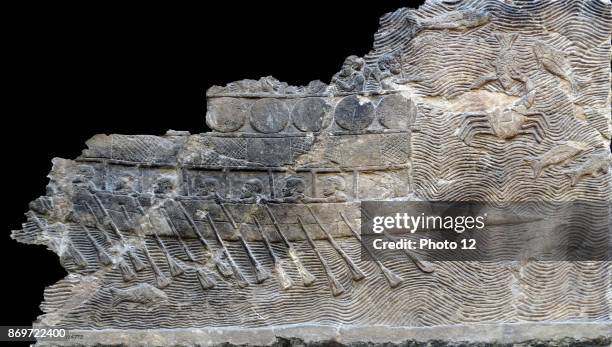 Assyrian relief, Warship . It is a bireme, with two rows of oars. About 700-692 BC From Nineveh, South-West Palace.