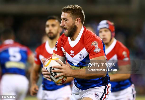 Julian Bousquet of France runs the ball during the 2017 Rugby League World Cup match between Australian Kangaroos and France at Canberra Stadium on...