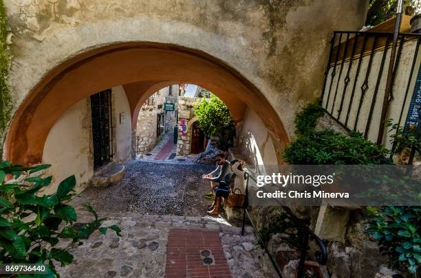 arched entrance to chapel in medieval eze, france - eze village fotografías e imágenes de stock